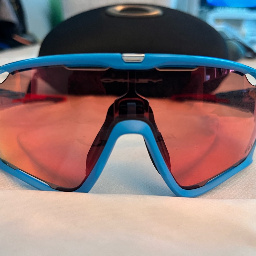 Oakley Vibrant Blue Sunglasses with Red Lenses